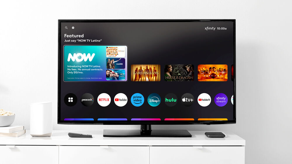 A Smart TV displaying the xFinity homescreen featuring NOW TV and other streaming apps